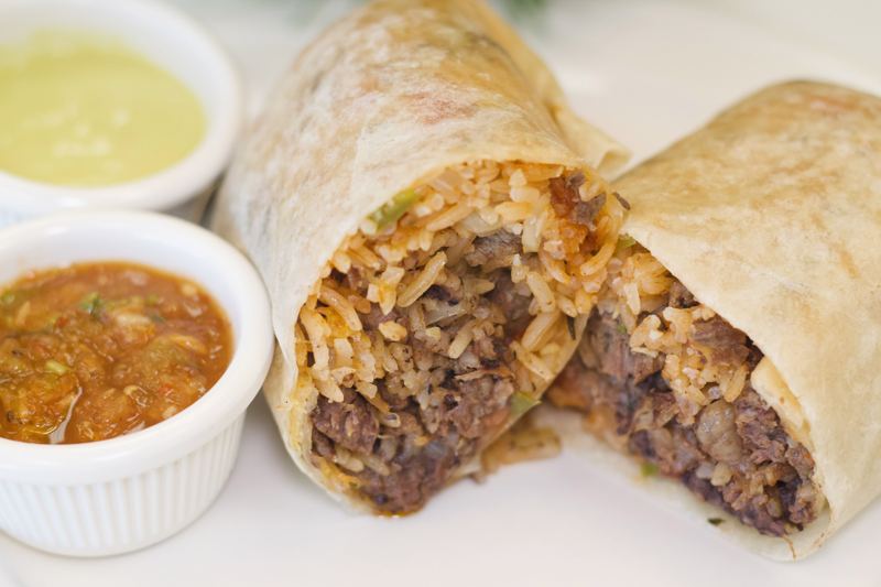 Birria burrito with salsas